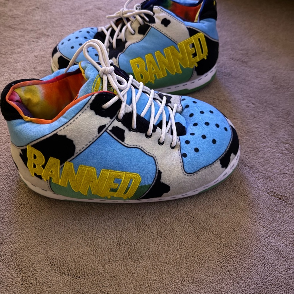 Banned goods unisex sneaker style slippers new without tags. Fits size 6-10.